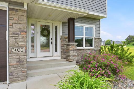 Covered front stoop keeps your guests dry, and your groceries.