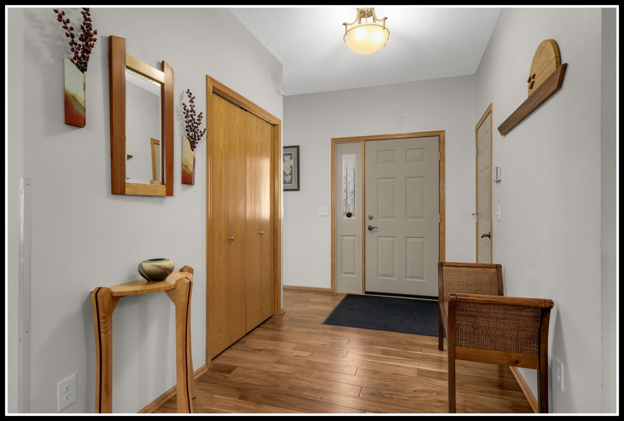 Hardwood floors start at the foyer and run throughout the main level