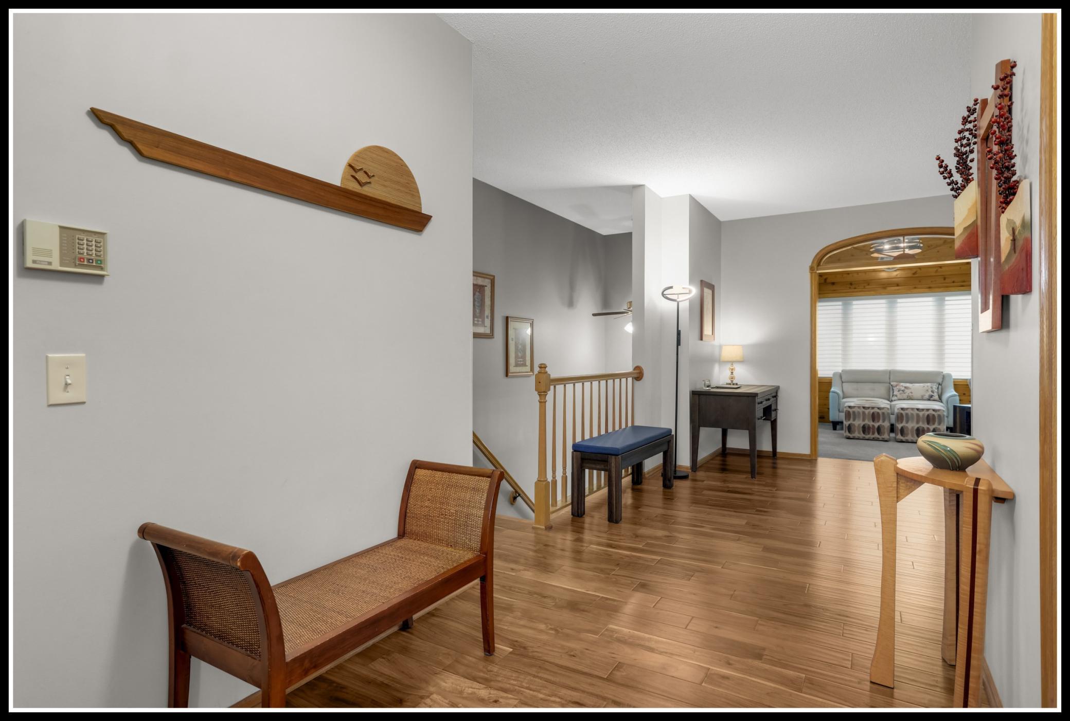 Welcoming foyer leads to the open living and dining room