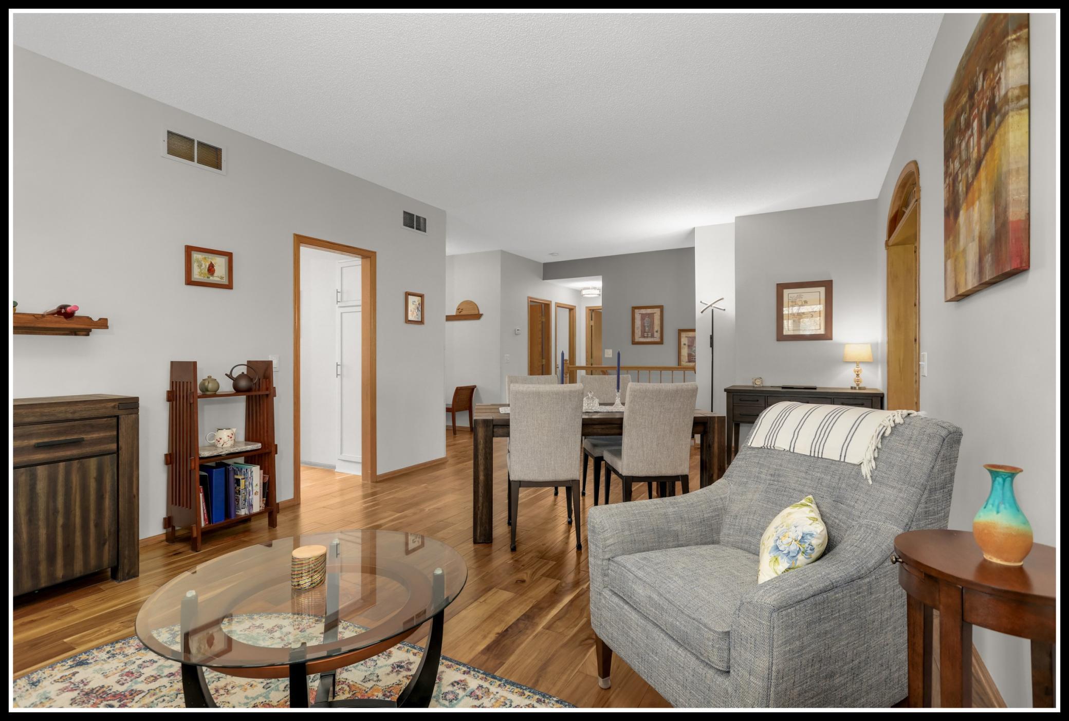 Walk-through access to the kitchen (door pictured left) and the cozy sunroom (door on the right)