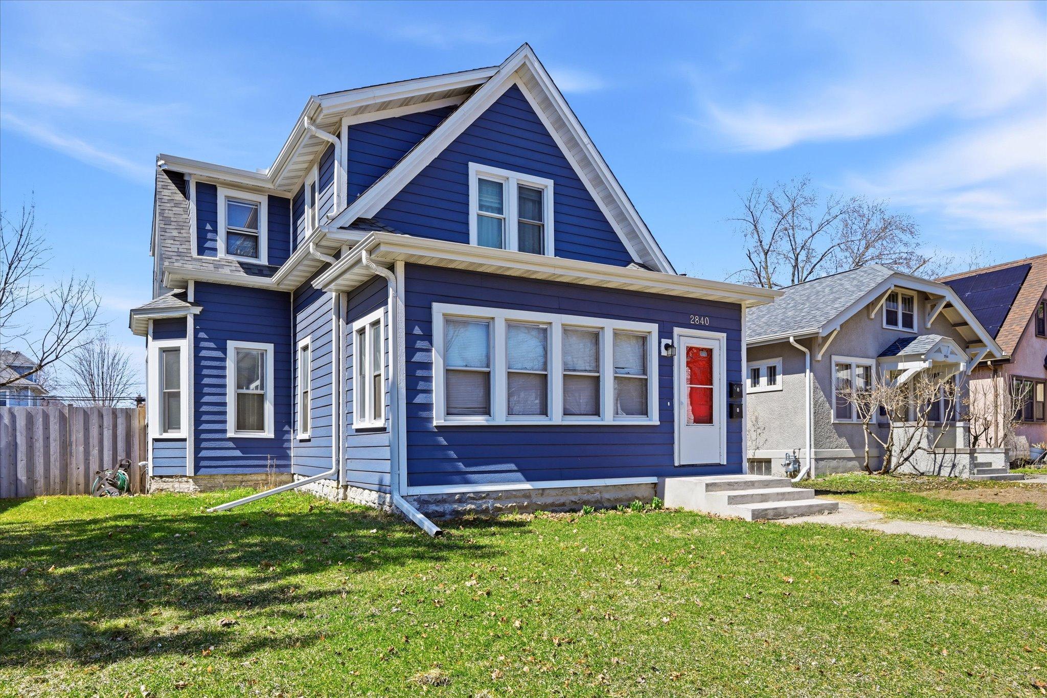 Font of Duplex - Siding and Paint Completed By Previous Owner - Less than 6 years old!