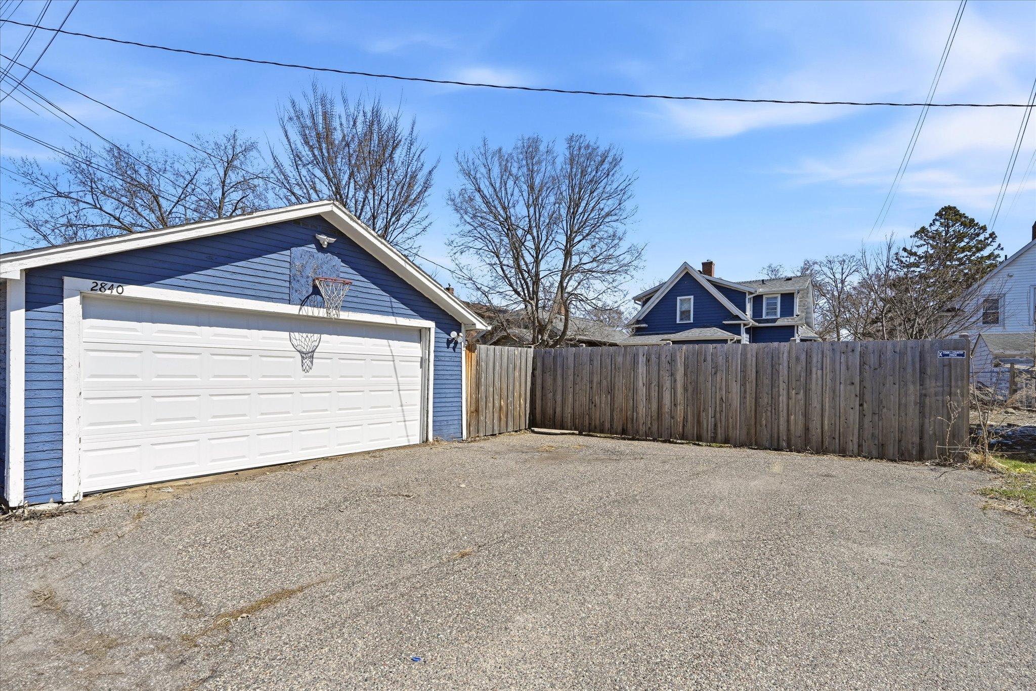 Large Parking Pad for 2+ Vehicles PLUS 2 Car Garage With NEW Garage Door (2026)