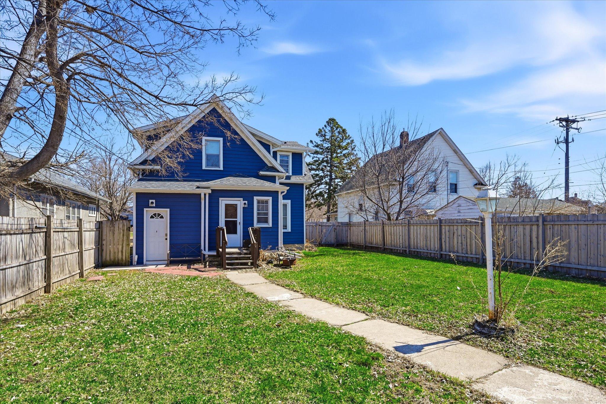 Back of Duplex Featuring Spacious (NEW) Fenced in Yard!