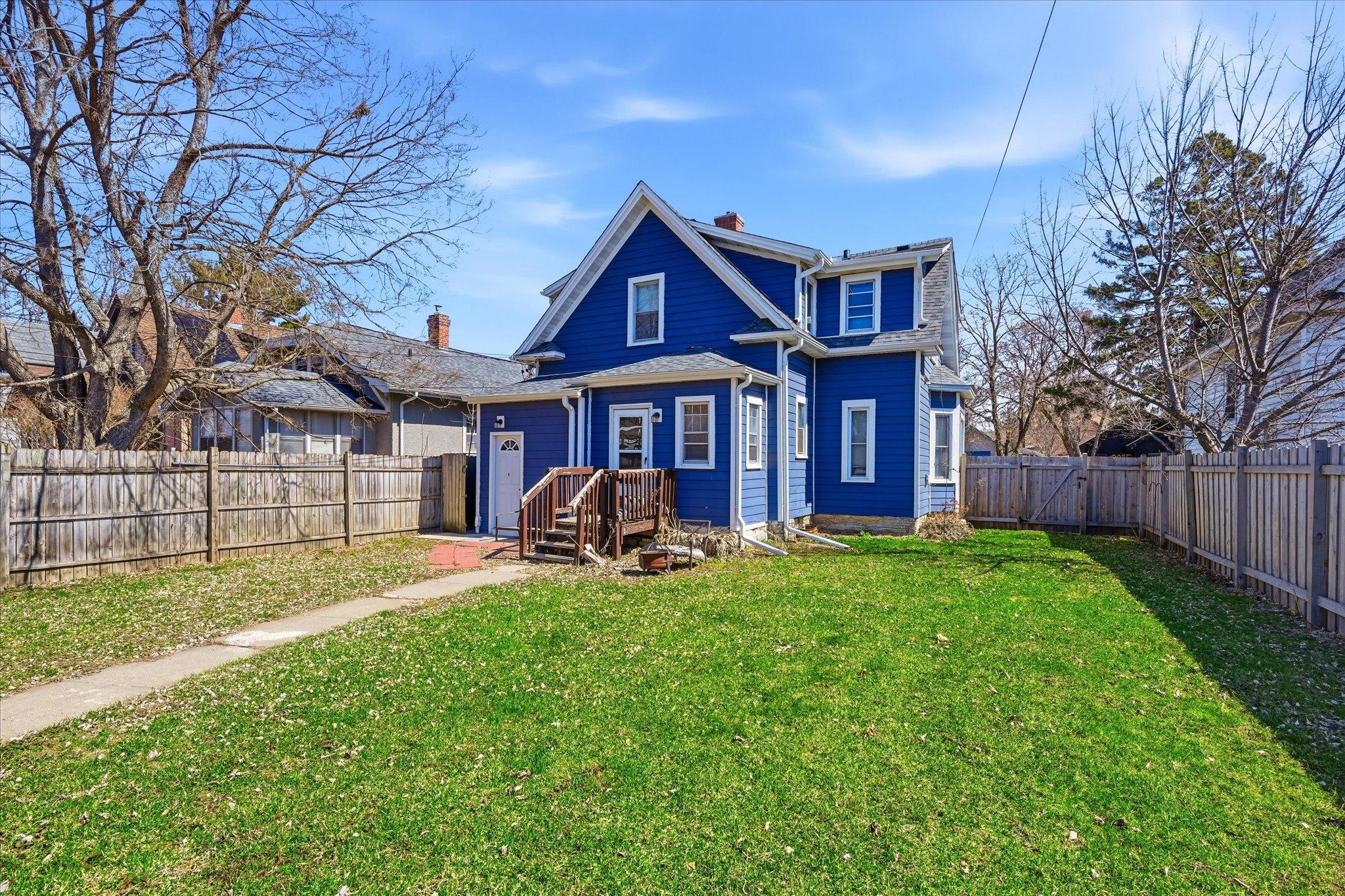 Back of Duplex Featuring Spacious (NEW) Fenced in Yard!