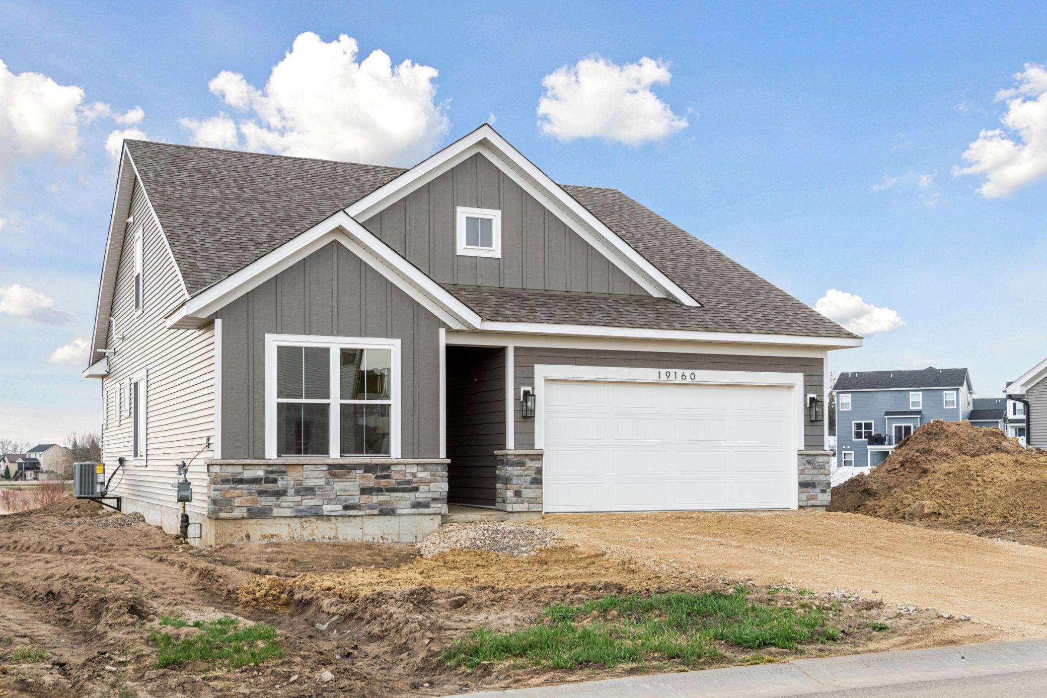Front Elevation - Driveway, landscpaing, sod, and irrigation included in the price of the home!
