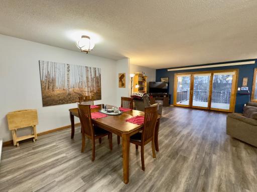 The dining room offers lots of space for entertaining in. It is an open floor plan to the living room.