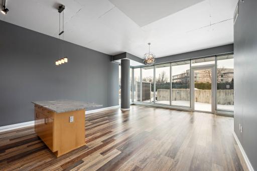 Large Living Space With Door Allowing Fresh Air