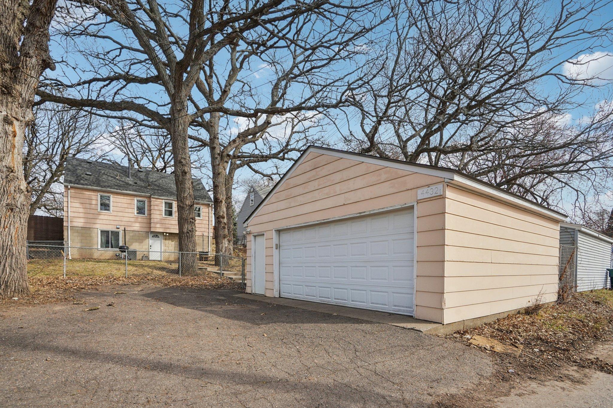Detached 2-car garage with additional parking