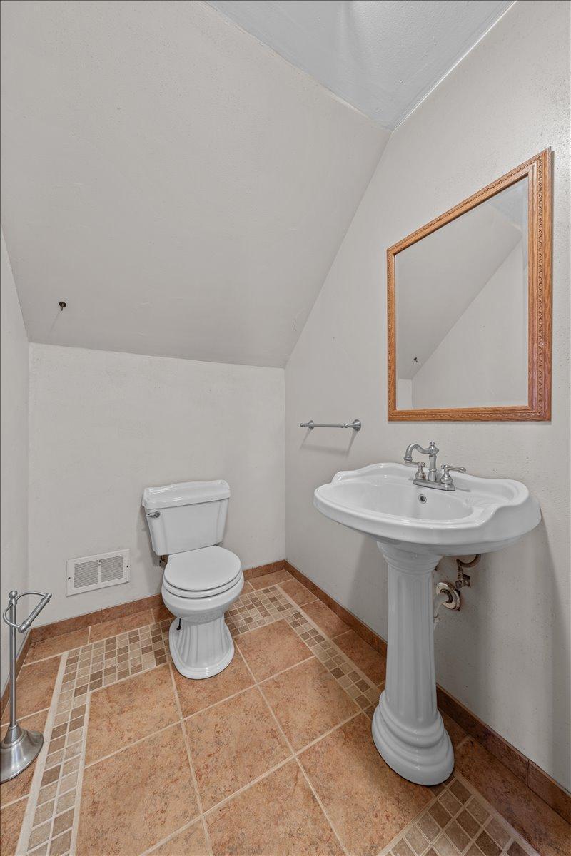 Upper level 1/2 bath.