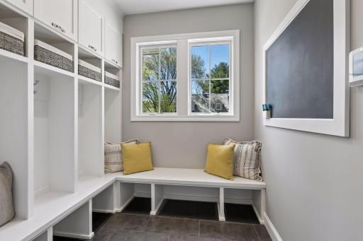Nice-sized mudroom and drop zone off of the garage