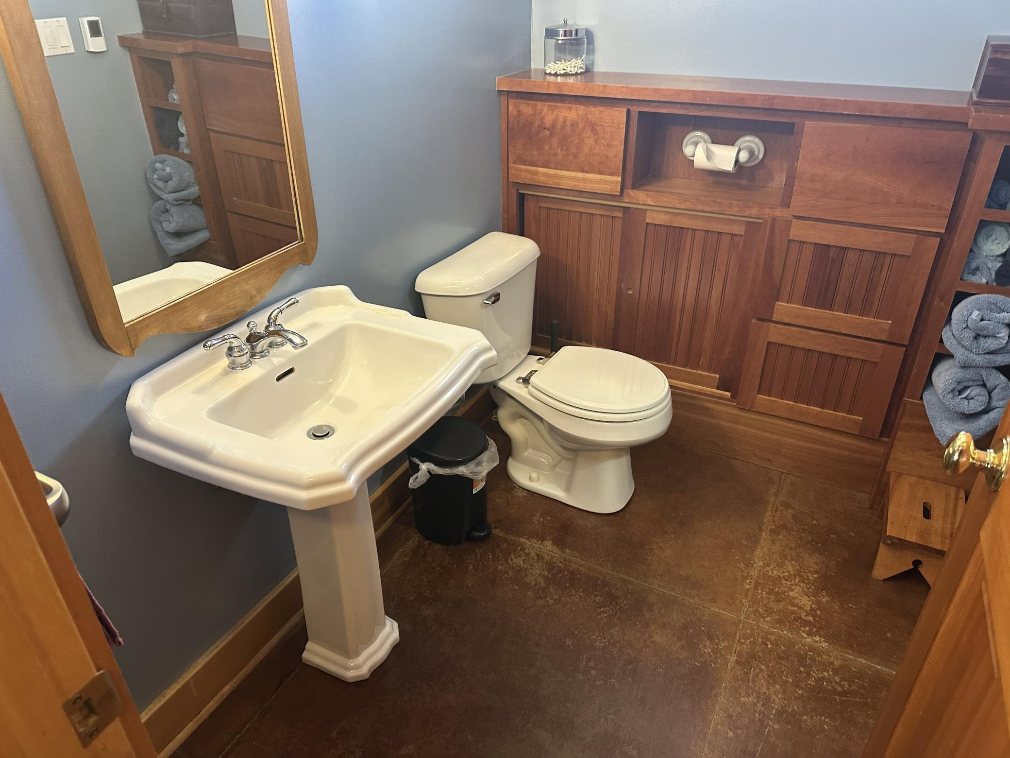 Main floor 3/4 bath with tiled heated flooring