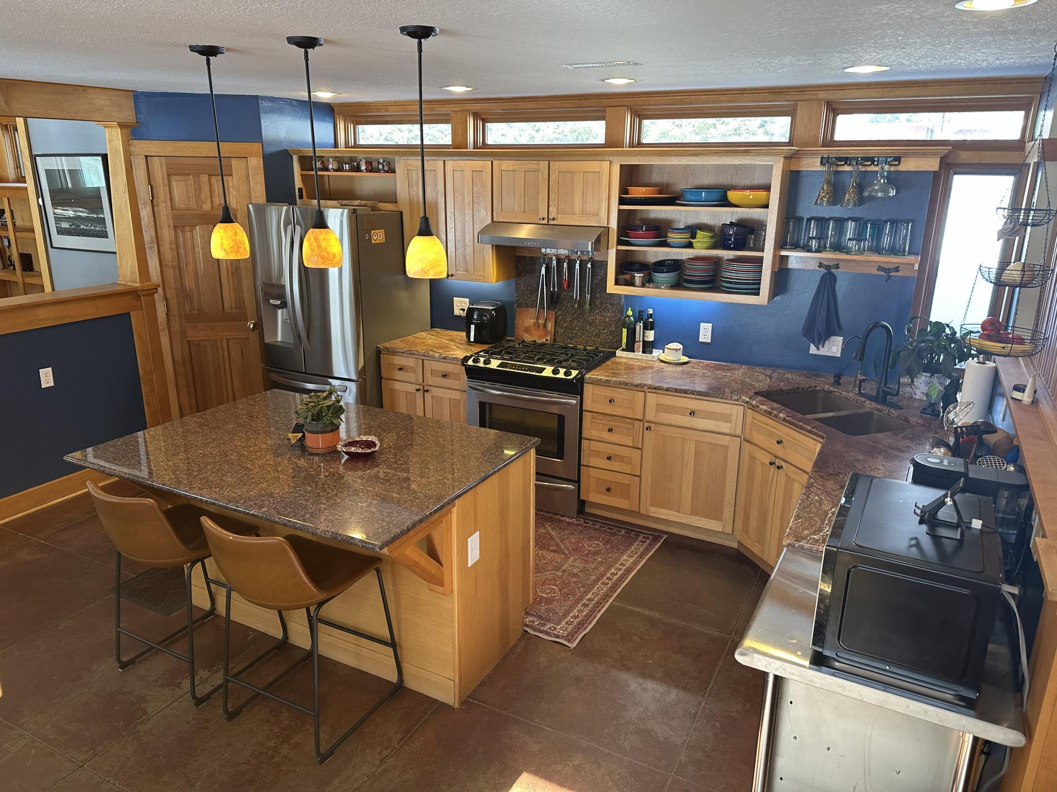 Great pendant lighting over the center island in this great kitchen