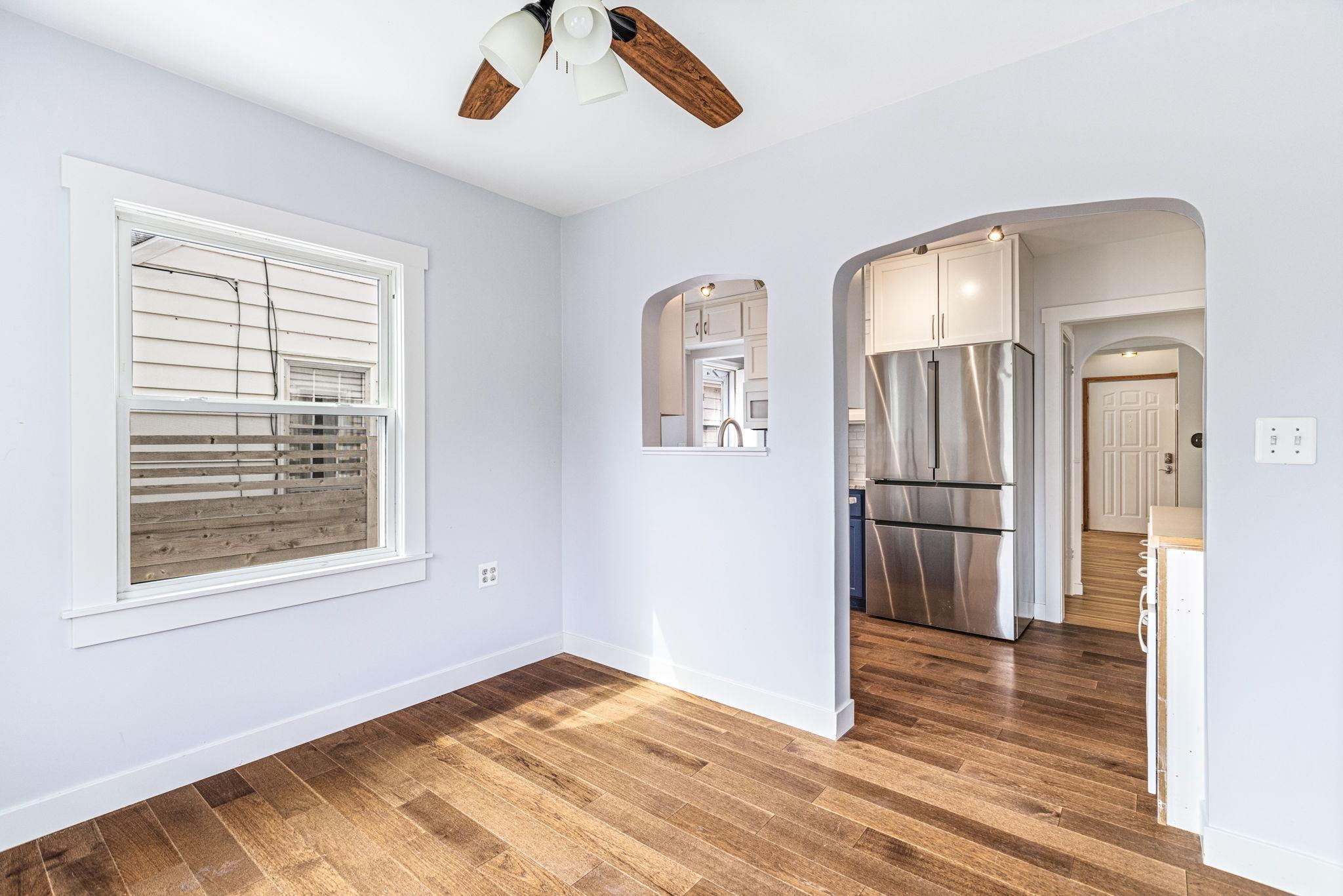 Dining area looking into kitchen.