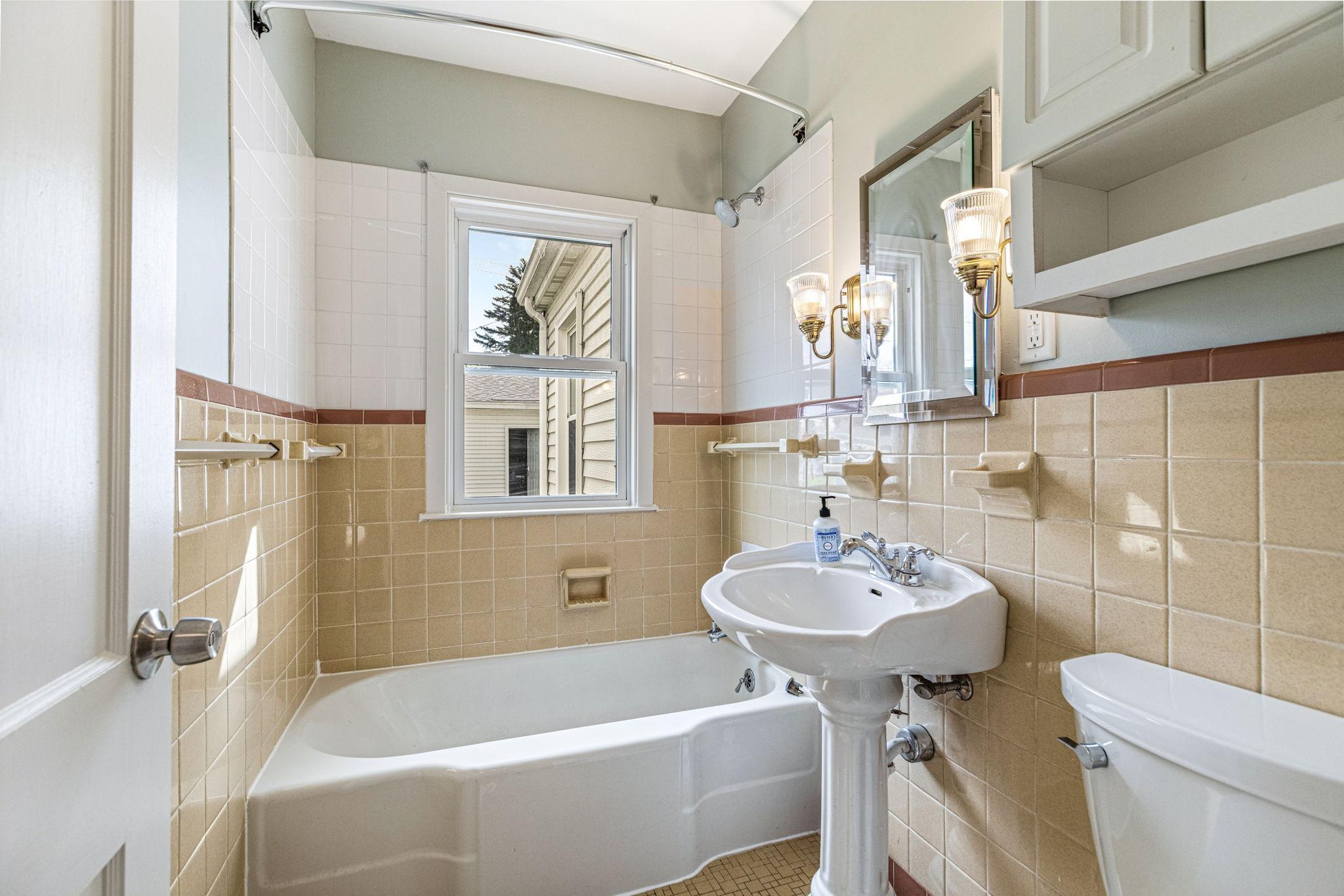 Main level full bathroom.