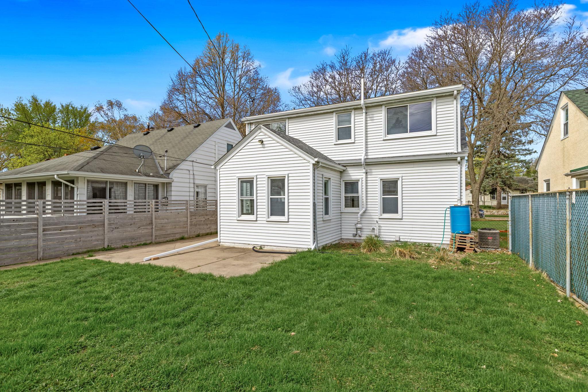 Backyard is fully fenced with patio and garden.