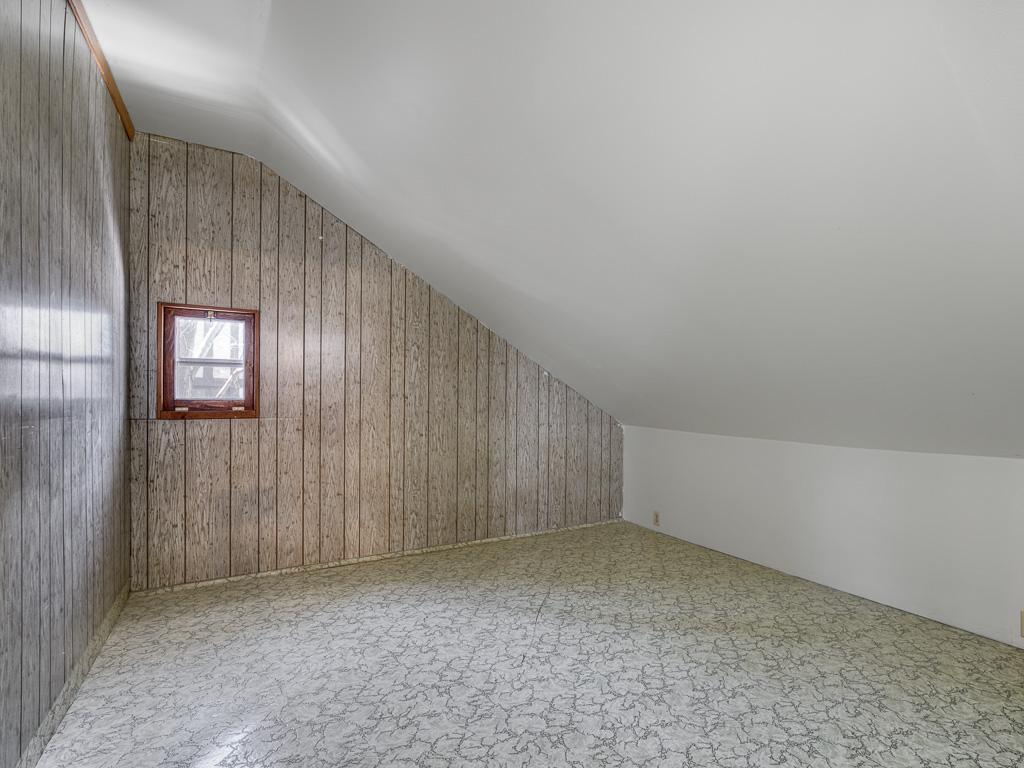 attic storage room has potential for more finished space