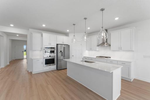A corner pantry provides plenty of storage space for culinary essentials