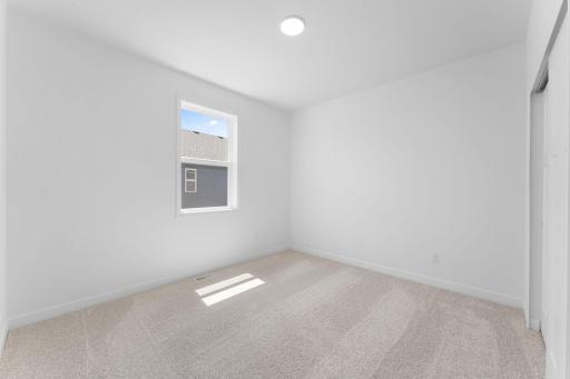 There are two secondary bedrooms down the hall from the ownerâs suite.