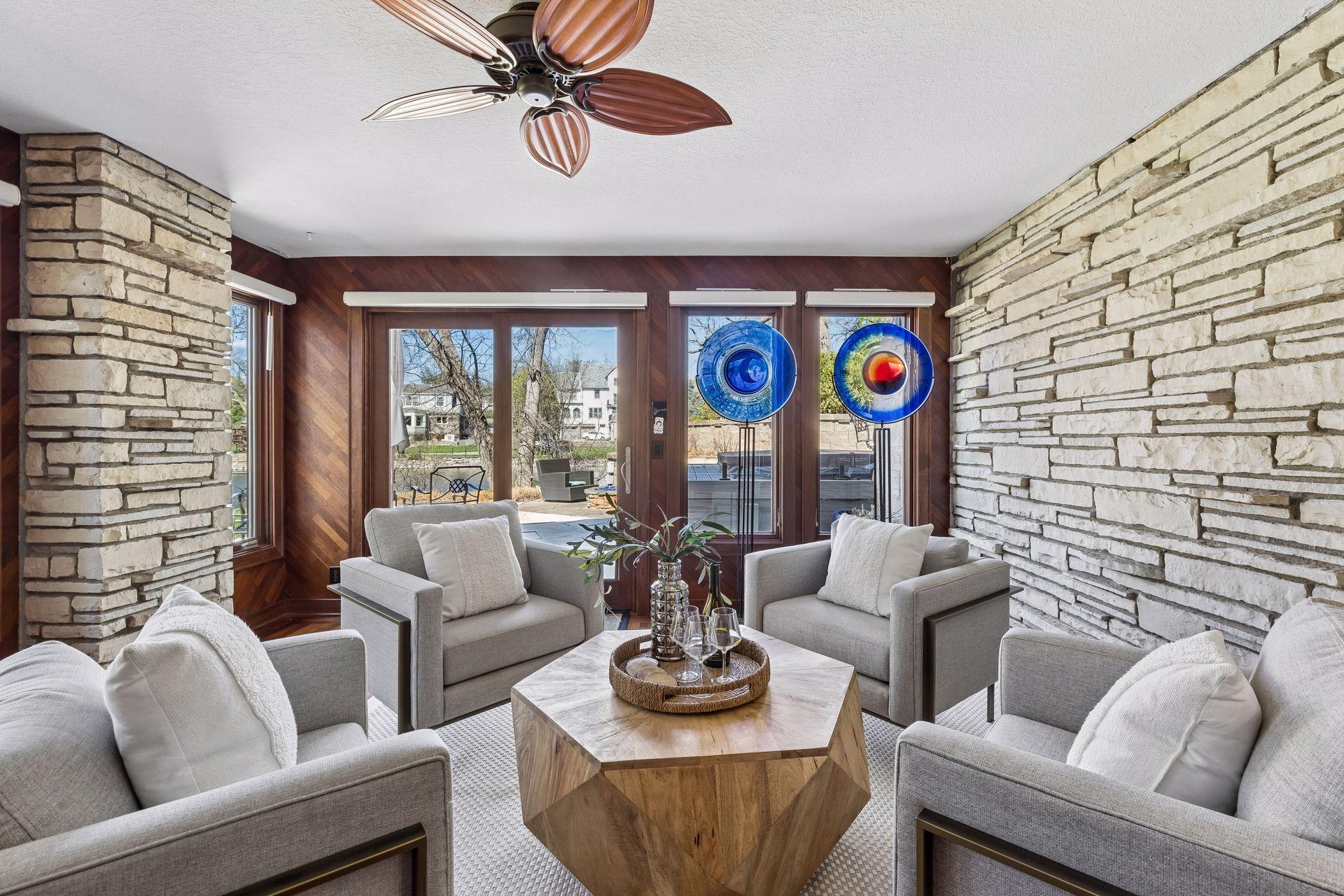 Sunroom with Large Sliding Glass Doors to Gas Firepit and Hot Tub