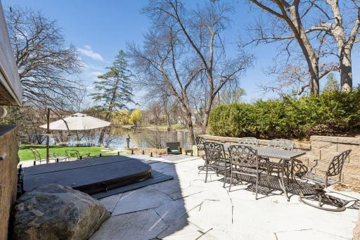 Second Tier Features the Hot Tub, Stone Pavers & Outdoor Dining Area