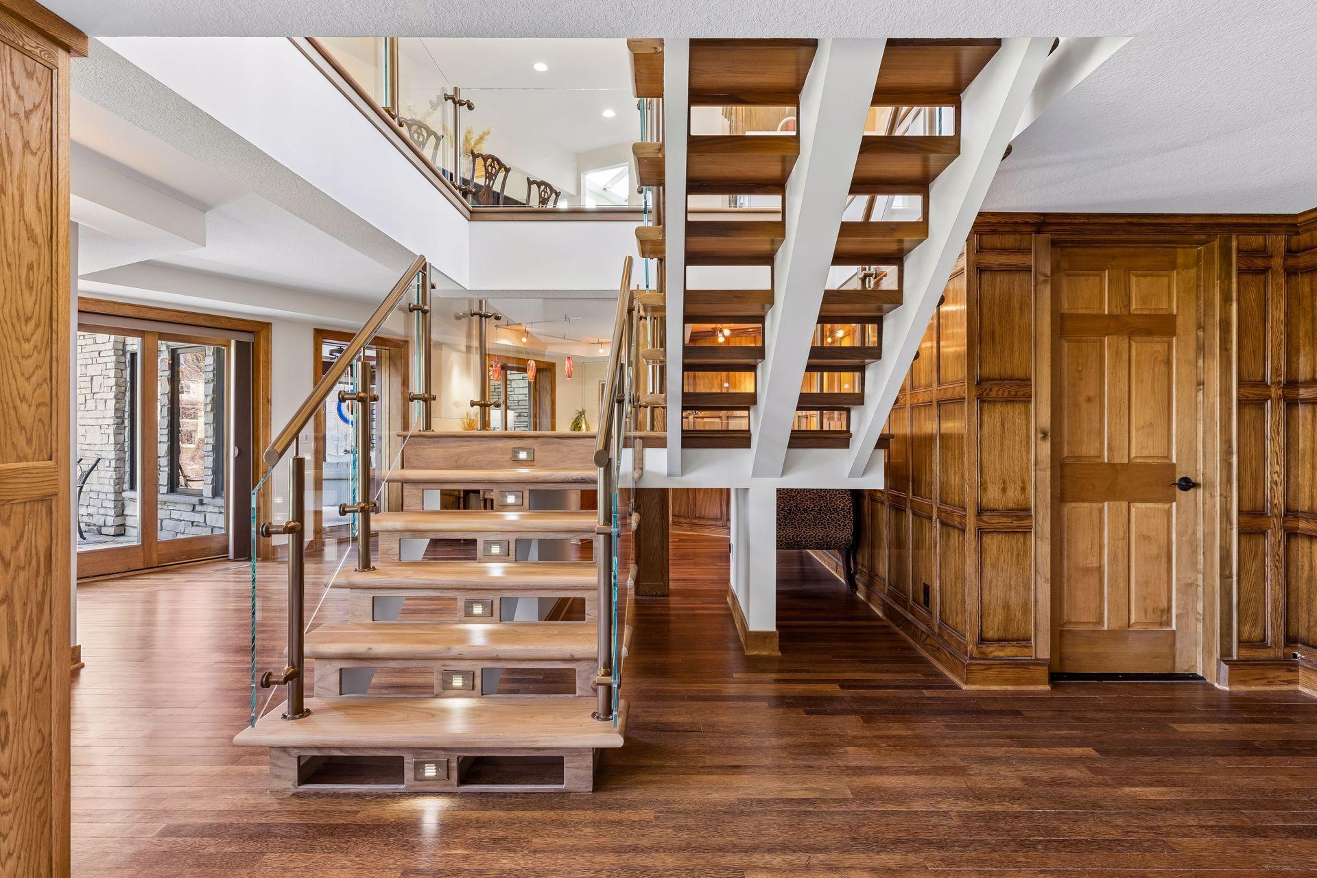 Striking Floating Staircase w/ Glass Railings