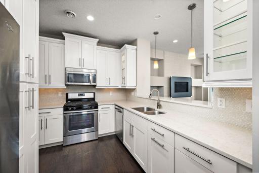 Beautiful Kitchen with stainless steel appliances, granite countertops, and more!