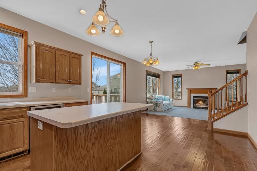 A center island with additional storage and a built-in outlet is ideal for both everyday living and hosting.