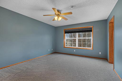 Spacious private primary suite that offers a relaxing retreat after a hard days work.