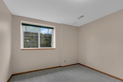 Fifth bedroom with a generous walk-in closet.