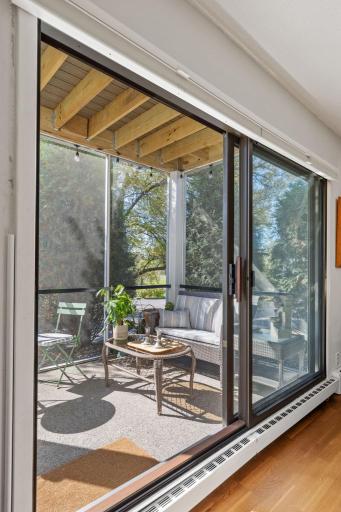 Screened porch just off the living room offers a great spot to relax and enjoy the outdoors.