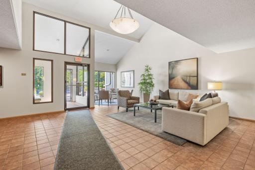 Inviting building lobby with seating area and welcoming common entrance.