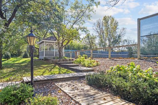 Gazebo and outdoor recreation area provide additional space to relax and enjoy the grounds.