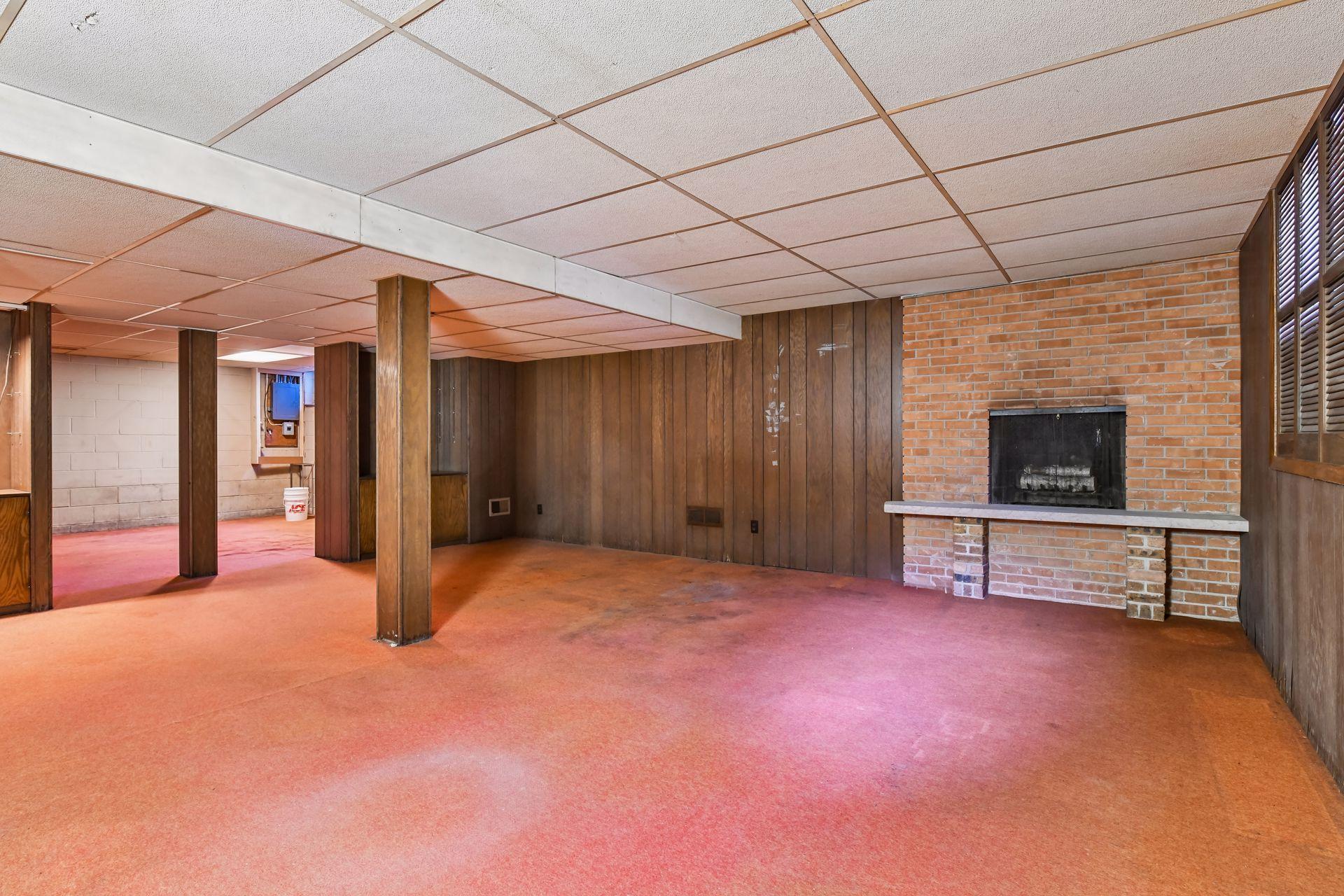 The lower level has another fireplace. Plenty of room to finish the lower level to add more living space.