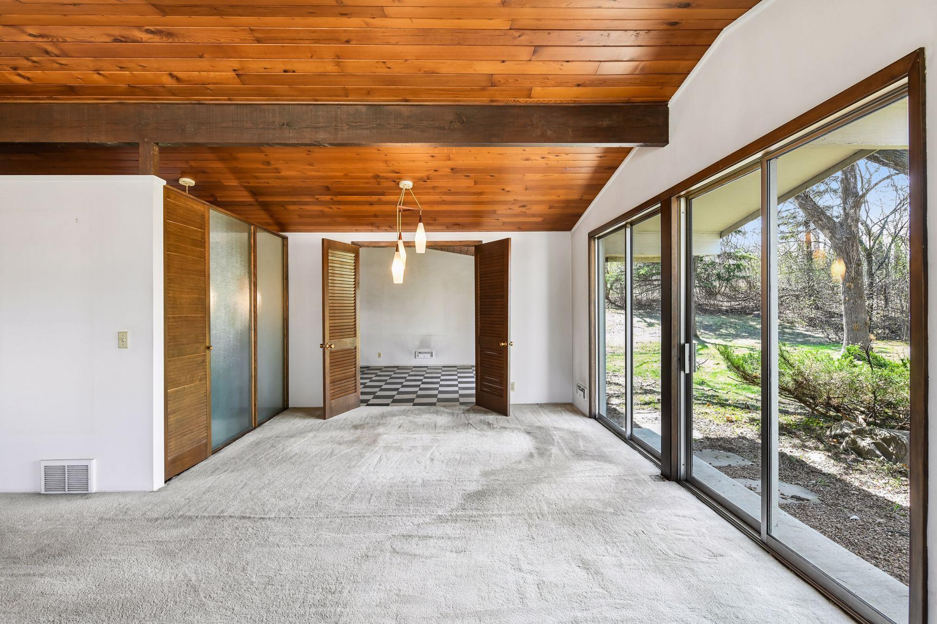 Vaulted wood ceilings throughout the home.