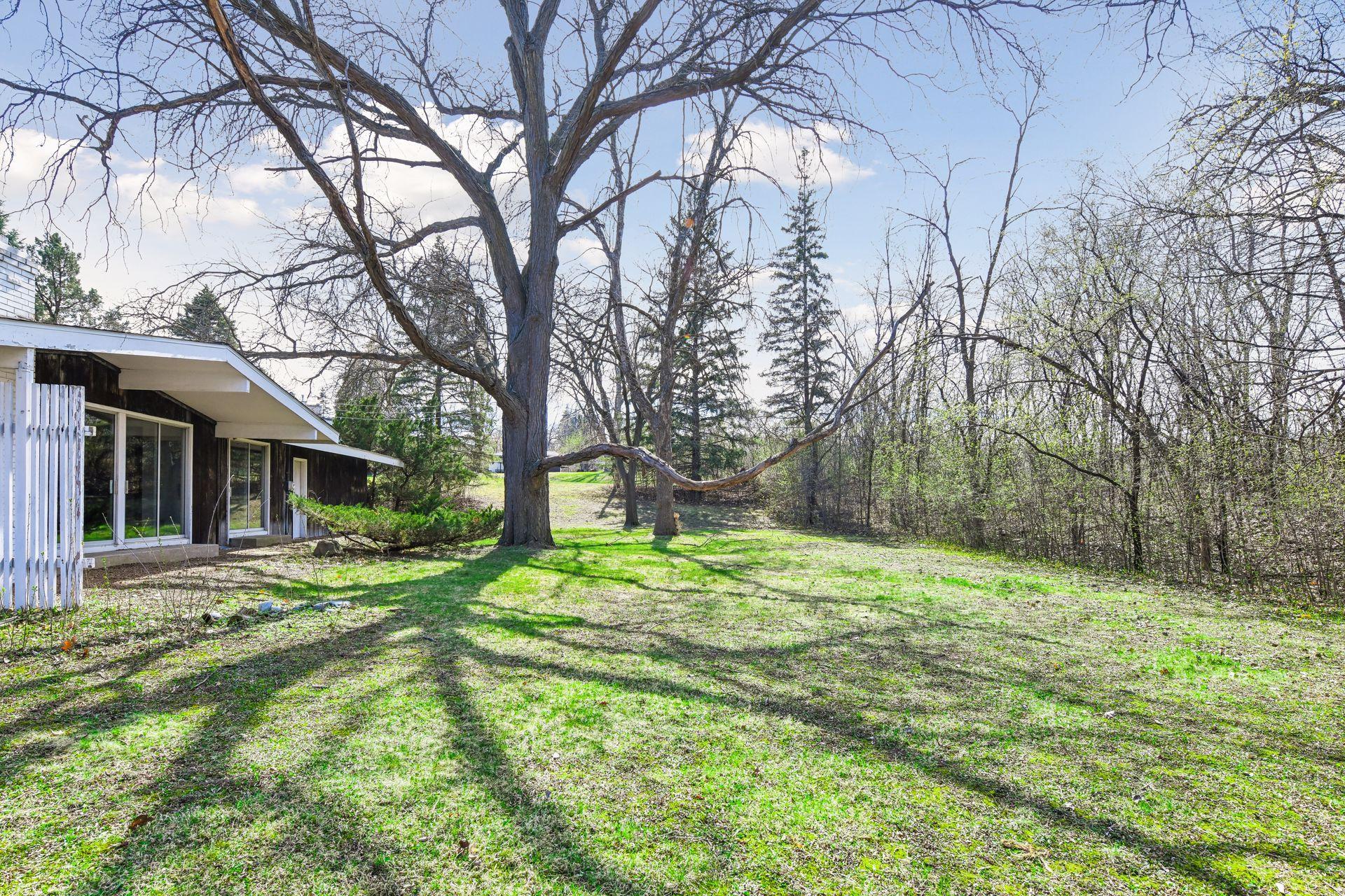 Home is ideally set on a large 0.8-acre lot in demand Crestview neighborhood.