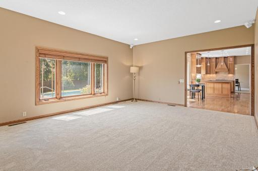 Gather and relax in the spacious family room, designed for comfortable everyday living. Fresh carpet and a welcoming layout make this an ideal space for movie nights, conversation, and time together.