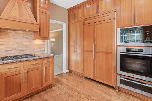 Stunning designer kitchen with abundant storage.