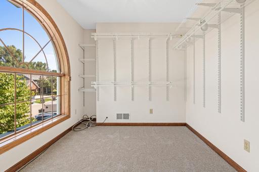 Huge walk in closet with new carpet. Feel organized with the abundant space.