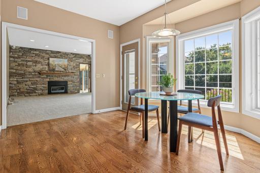 Its convenient placement between the kitchen and main living spaces creates a seamless flow for entertaining, dining, and enjoying the home's indoor and outdoor living spaces.