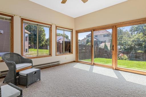 This peaceful retreat is perfect for morning coffee, relaxing with a book, or enjoying views of the gardens and pool.