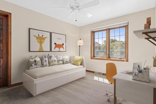 One of four bedrooms located upstairs with new carpet and great views to the backyard. Virtually staged.
