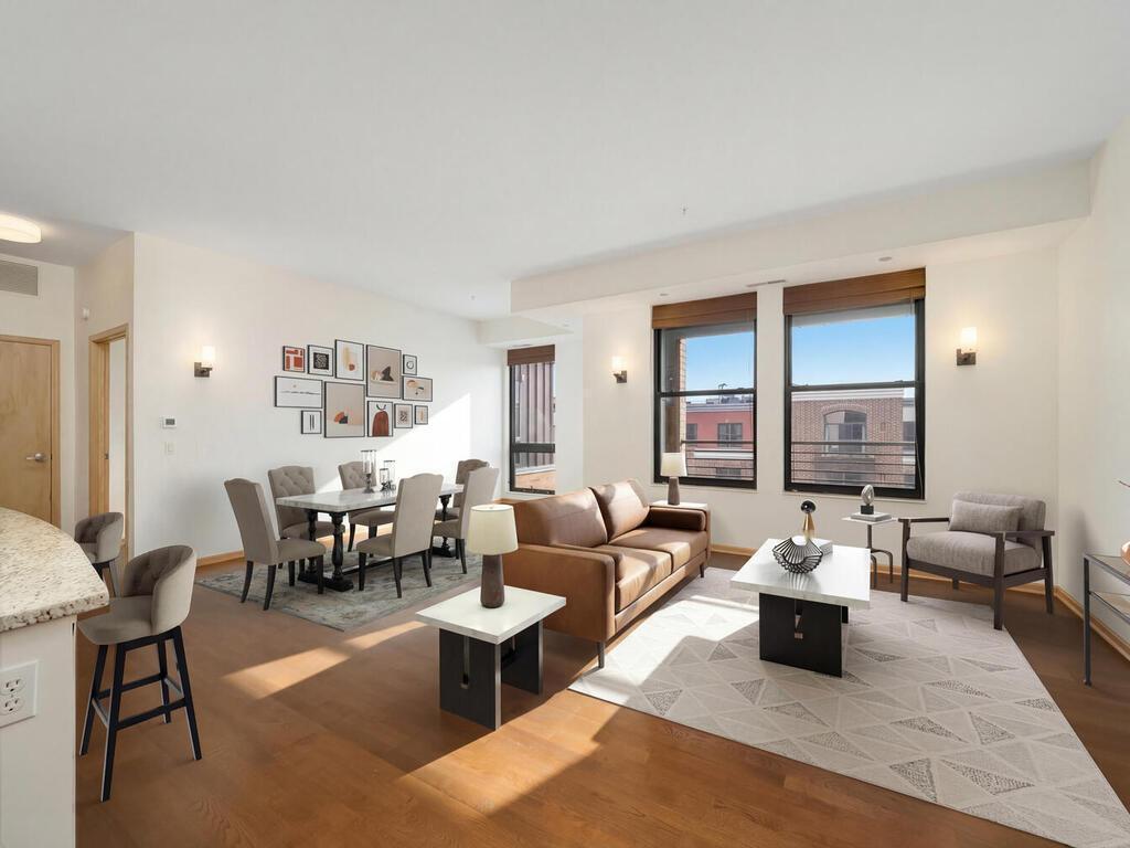 Experience the allure of this breathtaking, light-filled 2-bed, 2-bath open-concept condo with 10 ft. ceilings nestled within the prestigious Grand Condominiums, situated in the renowned Excelsior and Grand community. (Photo is virtually staged)