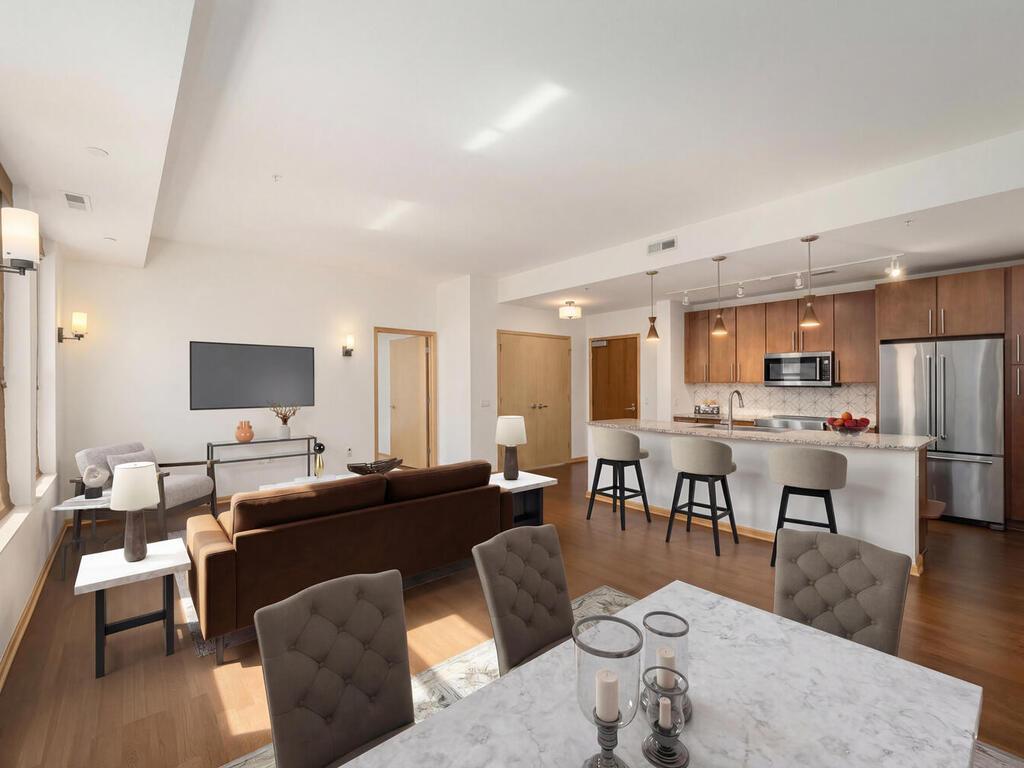 The 9-foot kitchen island comfortably seats four people and offers ample prep space for even the most skilled chefs. (Photo has been virtually staged)