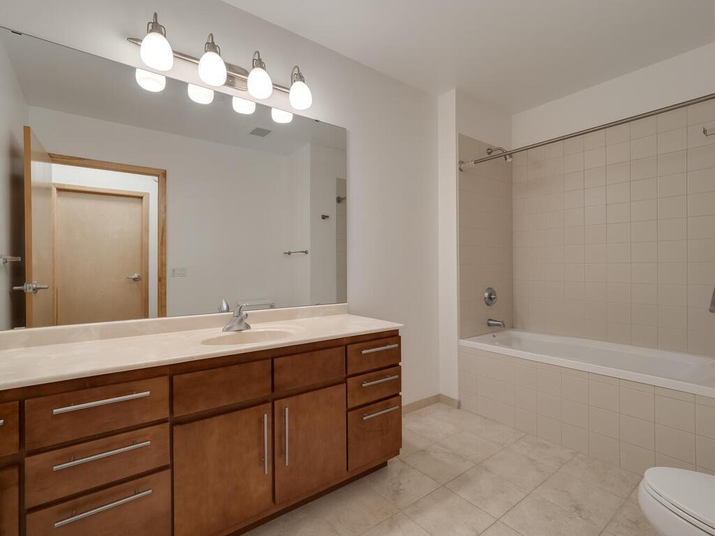 The large full-sized guest bath supports the common living area and the second bedroom.