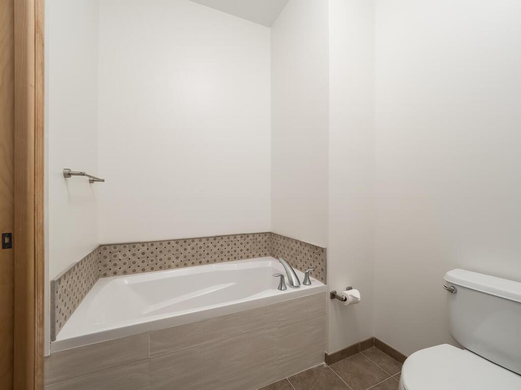 Primary bath's soaking tub.