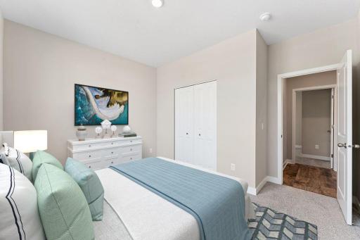 Front bedroom of the home is flooded with natural lighting! *Pictures are of model home; actual finishes may vary.