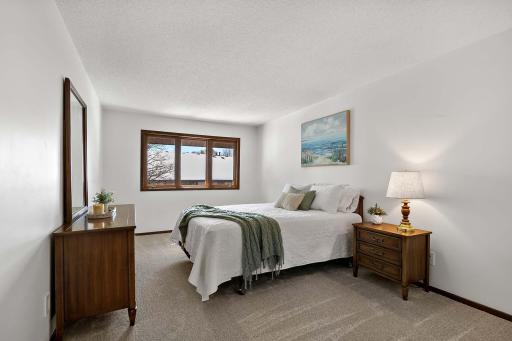 Spacious primary bedroom featuring a generous layout and a walk-in closet, offering plenty of room for comfort, organization, and everyday living.