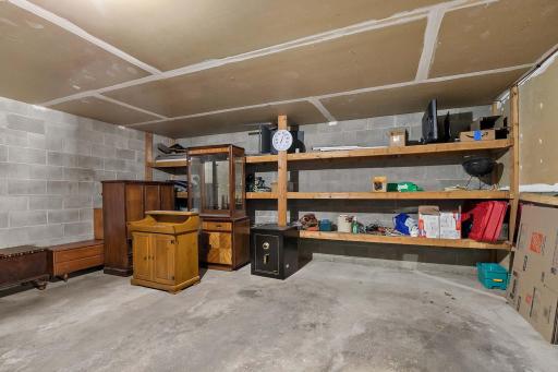 Garage with abundant built-in storage, perfect for organizing tools, equipment, and seasonal items.