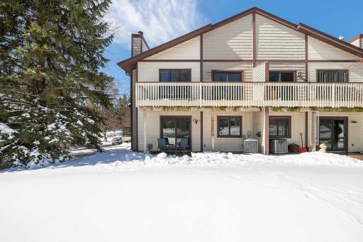 This home features a spacious upper-level deck and a walkout lower-level patio, offering multiple areas perfect for entertaining and relaxing.