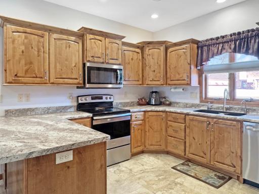 Knotty Alder cabinetry throughout kitchen!